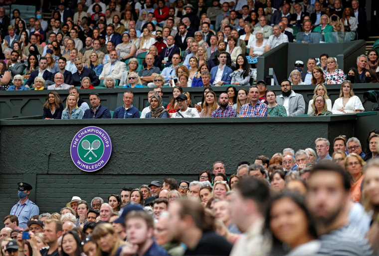 Image: Spectators watch on Centre Court on the eighth day of the 2021 Wimbledon Championships at The All England Tennis Club in Wimbledon,