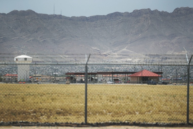 Fort Bliss, which holds temporary housing for migrants is seen through a fence on June 25, 2018 in Fort Bliss, Texas.