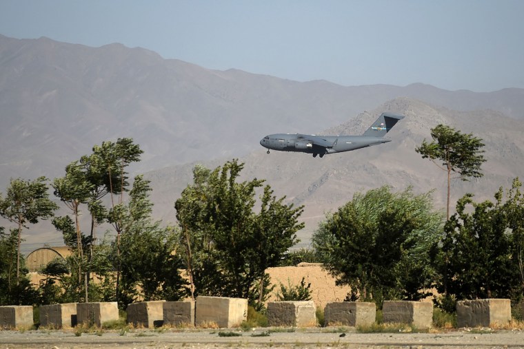 Image: A U.S. Air Force transport plane lands at the Bagram Airfield.