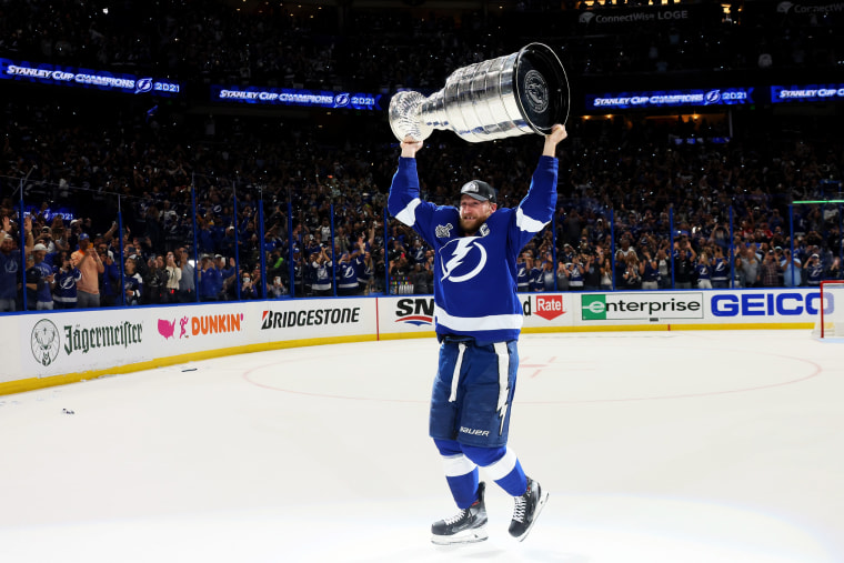Steven Stamkos #91 of the Tampa Bay Lightning hoists the Stanley Cup after their 1-0 victory against the Montreal Canadiens in Game Five to win the 2021 NHL Stanley Cup Final at Amalie Arena on July 07, 2021, in Tampa, Fla.