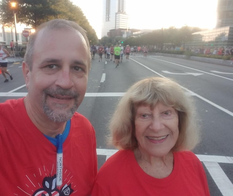 Christine Beard and her son Garth take part in the Peachtree Road Race in Atlanta on July 4.