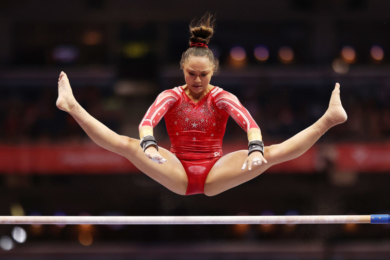 Emma Malabuyo competes on the uneven bars during the Women's competition