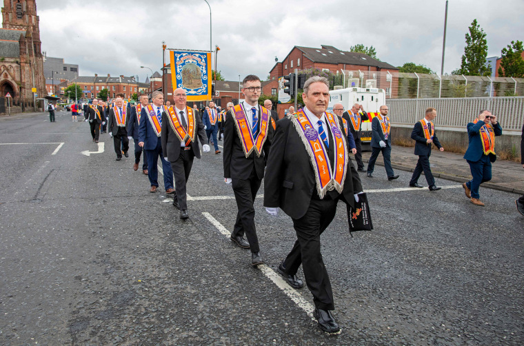 Image: Orangemen begin their march in Belfast city center during the 12th July Orange marches in Belfast