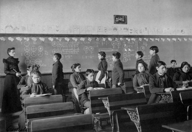 Image: Students study in a classroom at the Carlisle Indian Industrial School in Carlisle, Pa..