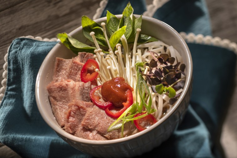 The pho is available at The Noodle Exchange, located near Traveler's Cafe.