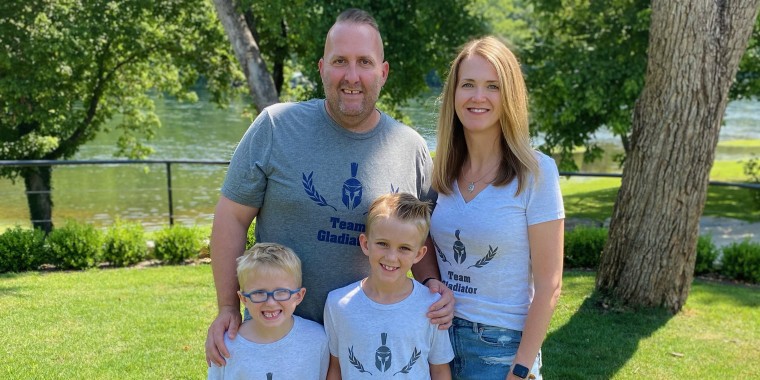 Eric South shares a happy moment with his wife and two sons. "Normal is going to be different than before," he said after his glioblastoma diagnosis.