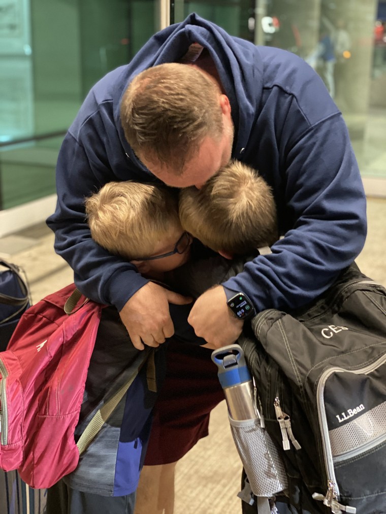 South hugs his sons. The treatment for glioblastoma left him feeling like "an old man," so he's focused on building up his strength.