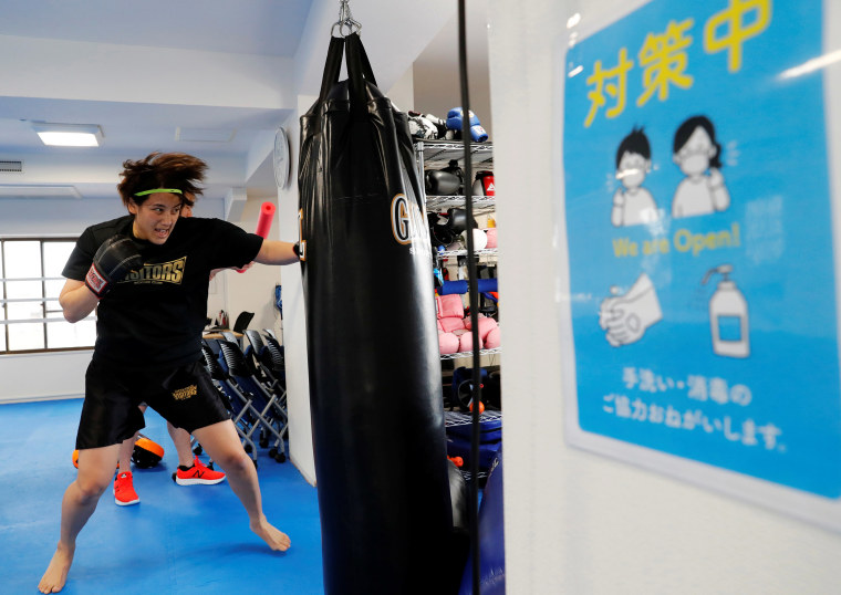 The Wider Image: Japanese boxing nurse has Olympic dream crushed by COVID
