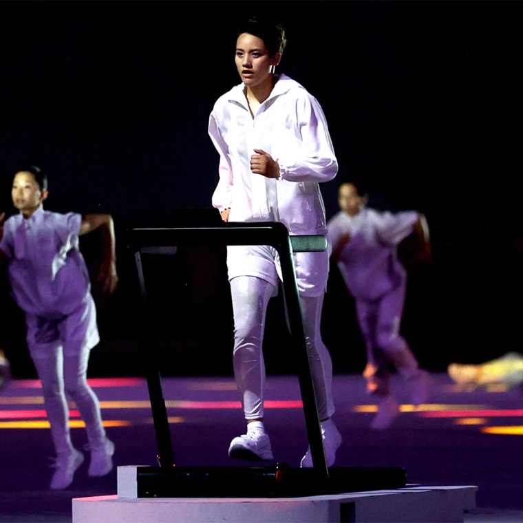 Boxer Arisa Tsubata at the opening ceremony on the treadmill
