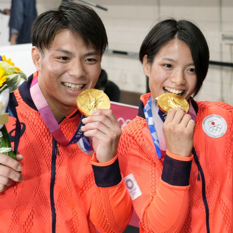 Japanese judoka Hifumi Abe, left, and his younger sister and judoka Uta Abe pose for a photo