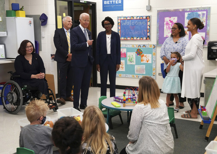 Image: President Joe Biden praises Congresswoman Lauren Underwood as they tour the Children's Learning Center at McHenry County College on July 7, 2021 in Crystal Lake, Ill.
