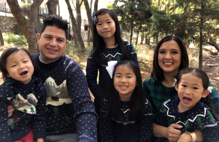 Isabel Márquez, seen with her husband and their four children. Because masks are not required in schools this year, and their two youngest children are in kidney failure, it felt too risky to send any of their kids to school.