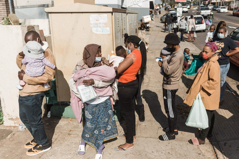 Image: A long queue of people wanting basic food and baby items at the Legends Diner organized by Muslims For Humanity in Durban, South Africa