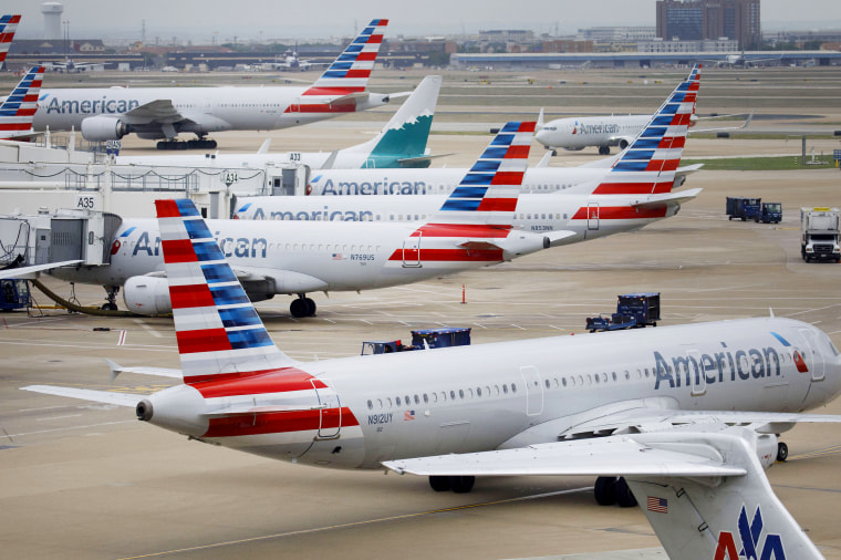 American Airlines planes stand at Dallas-Fort Worth International Airport.