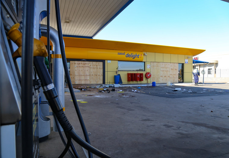 Image: A gas station outside the Ridge shopping center in Durban, South Africa was looted during riots last week.