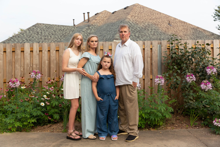 Jennifer and Lorne Carter with their daughters, Lucy and Natalie.