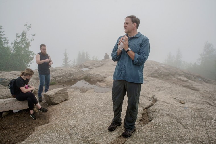 New Hampshire Gov. Chris Sununu at the summit of Mount Major in Alton, N.H., on July 15, 2021.