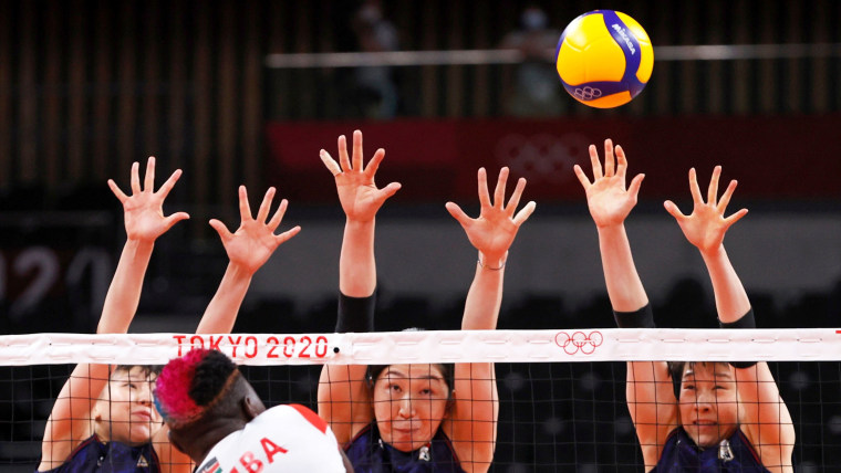 Kenya's Sharon Kiprono goes up against Japan's volleyball team at the Tokyo Games on July 25, 2021.