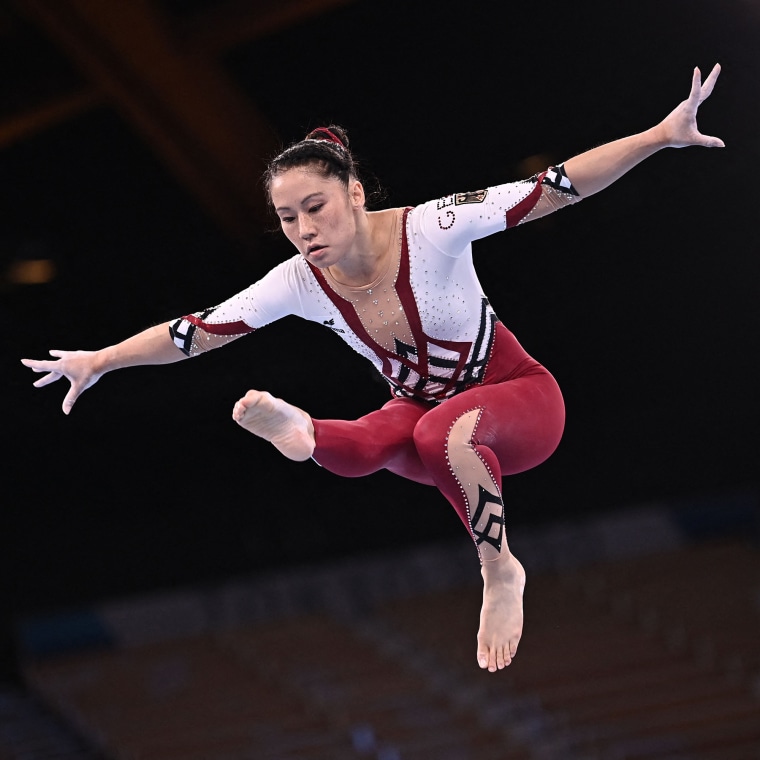 Why do gymnasts wear long sleeved leotards? - Quora