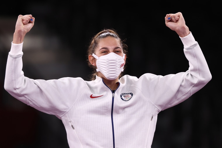 Gold medallist Anastasija Zolotic of the United States poses at a victory ceremony for the women's