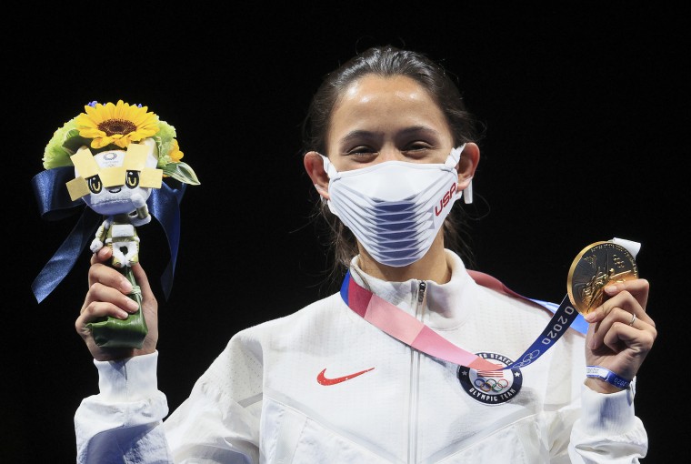Gold medallist Lee Kiefer of the United States poses at a victory ceremony for the women's foil fencing