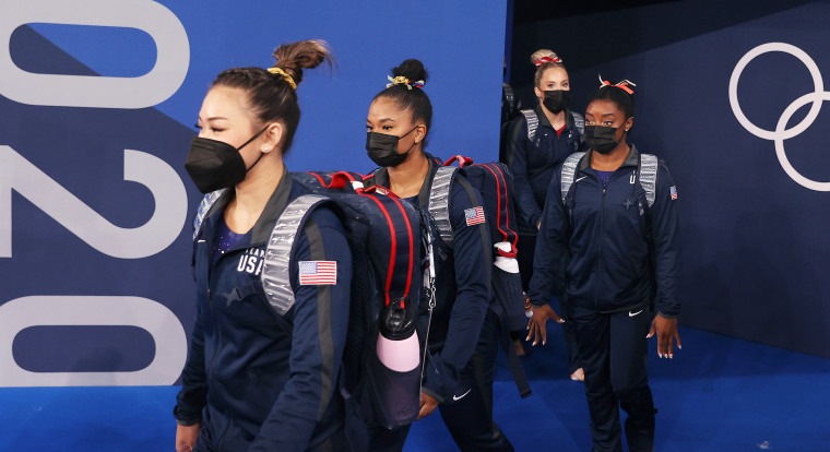 Team USA enter the arena wearing face masks on day two of the Tokyo 2020 Olympic Games at Ariake Gymnastics Centre