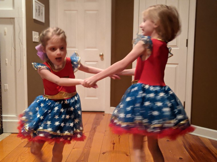 Emma and Sara, 7, love to dance. Their mom Stacy Staggs is lobbying lawmakers to include the full $400 billion in the infrastructure bill for home and community based services so that families with children with complex medical needs can keep them at home. 