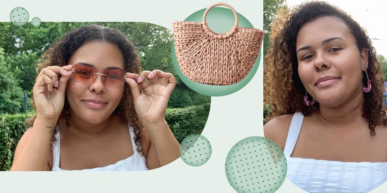 Image of Kamari Stewart wearing the Moloch Acrylic Statement Earrings and Dollger Rimless Rectangle Sunglasses, and the Erouge Natural Chic Straw Bag