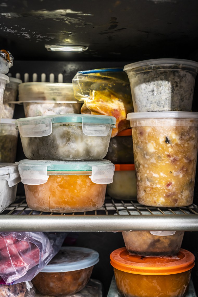 A freezer fully stocked with meals.