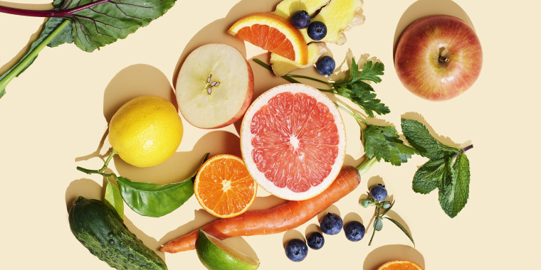 fruit and vegetables on peach surface