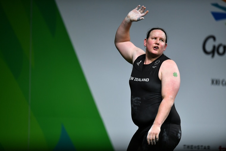 Laurel Hubbard of New Zealand waves to the crowd.