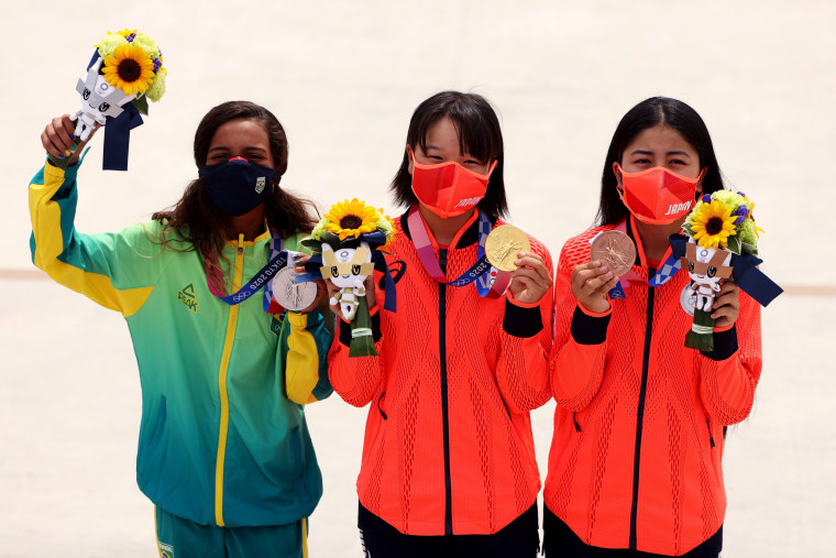 Image: From left, Rayssa Leal of Team Brazil and Momiji Nishiya and Funa Nakayama of Team Japan with their medals on Monday.