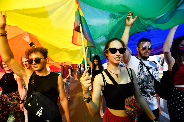 People attend the Budapest Pride march in Hungary on July 24, 2021.