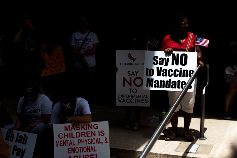 Anti-vaccine protesters gather outside Houston Methodist Hospital in Houston, Texas, on June 26, 2021.