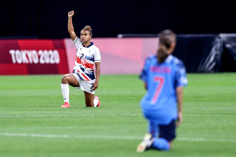 Image: Nikita Parris #7 of Team Great Britain takes a knee prior to the Women's First Round Group E match between Japan and Great Britain on day one of the Tokyo Olympic Games at Sapporo Dome on July 24, 2021 in Sapporo, Hokkaido, Japan.