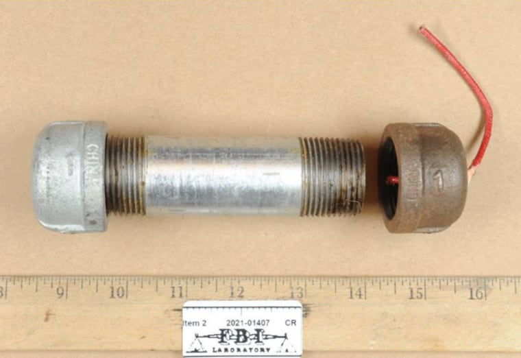 A partially assembled pipe bomb
