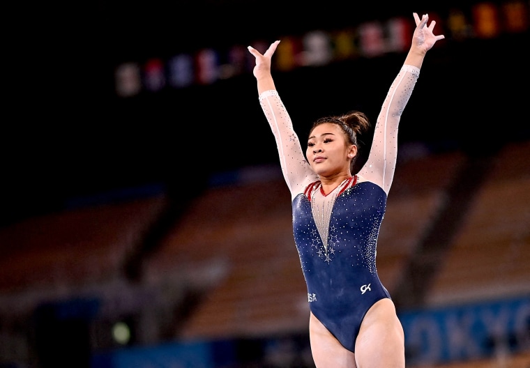 Image: Sunisa Lee of the United States competes in the balance beam event of the artistic gymnastics women's all-around final during the Tokyo Olympic Games at the Ariake Gymnastics Centre on July 29, 2021.