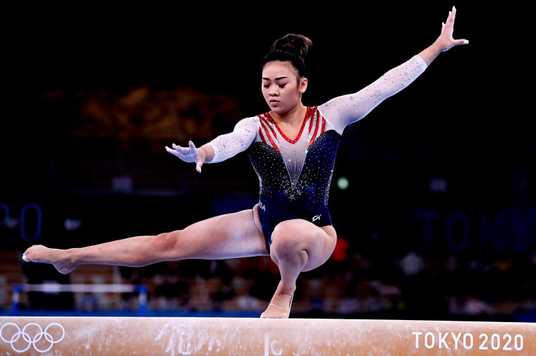 Image: Sunisa Lee of the United States performs on the balance beam at the Tokyo 2020 Olympic Games.