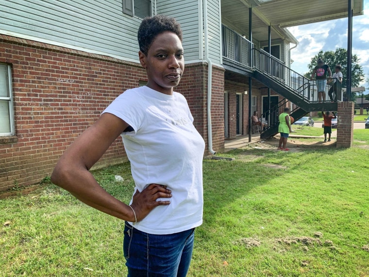 Demia Burse in front of her apartment complex in Jackson, Miss.