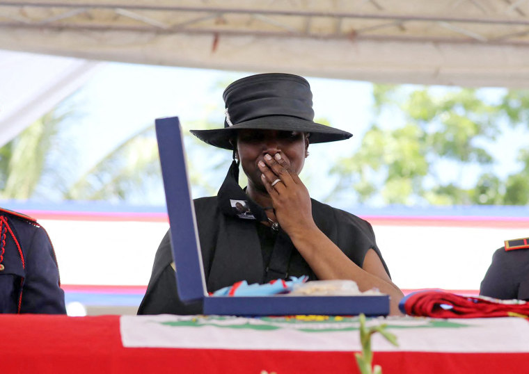 Martine Moise grieves during the funeral for her husband, slain Haitian President Jovenel Moise, on July 23, 2021, in Cap-Haitien, Haiti.