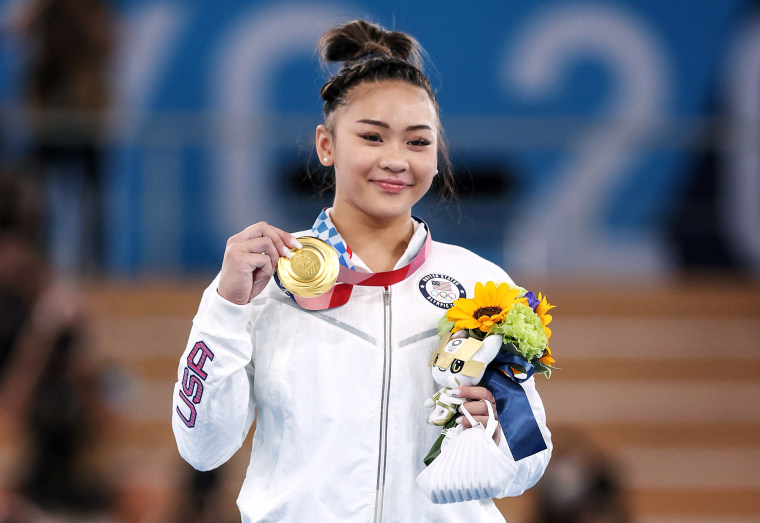 Image: Sunisa Lee of Team United States poses with her gold medal after winning the Women's All-Around Final on day six of the Tokyo Olympic Games at Ariake Gymnastics Centre on July 29, 2021.