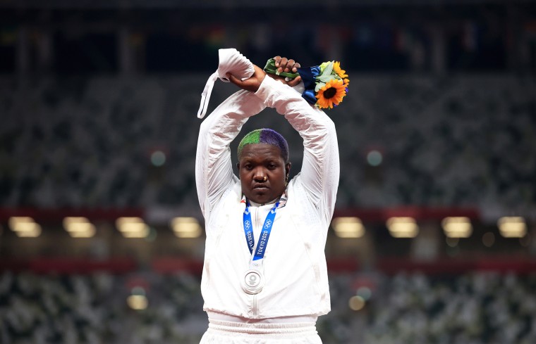 Raven Saunders of the United States raises her arms in an X on the podium at the Tokyo Games on Aug. 1, 2021.
