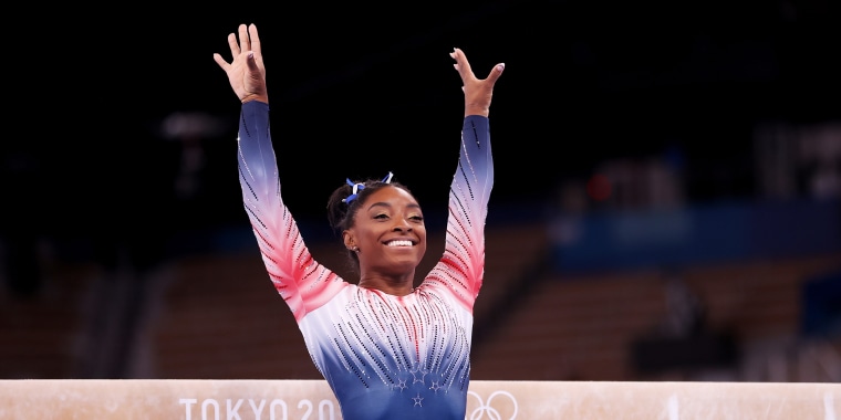 Simone Biles competes in the individual balance beam finals at the Tokyo Olympics.