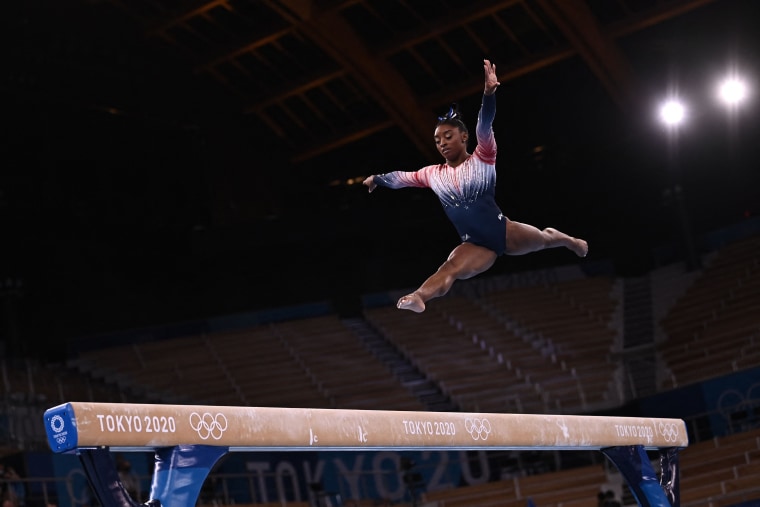 Simone Biles took to the beam Tuesday after withdrawing from several of the gymnastics competitions she qualified for the previous week.