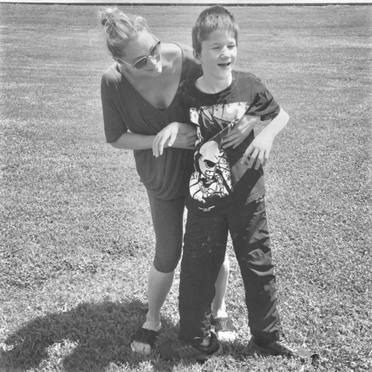 Jessica Ronne is pictured with her profoundly disabled son, Lucas. Autism is just one of Lucas's diagnoses.