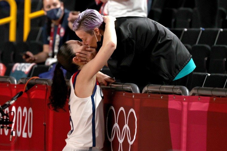 Sue Bird #6 of Team United States kisses Megan Rapinoe in celebration after the United States' win over Japan in the Women's Basketball final game on day sixteen of the 2020 Tokyo Olympic games at Saitama Super Arena on August 08, 2021.