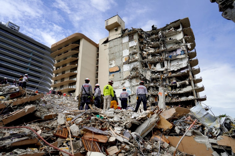 Search and rescue personnel work at the site of a collapsed Florida condominium complex in Surfside, Fla., on July 2, 2021.