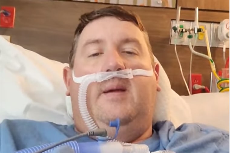 Image: Travis Campbell has been making Facebook videos and posts asking people to get vaccinated against Covid-19 after testing positive and being hospitalized for the virus.