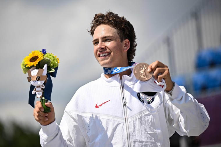 Image: Bronze medallist Jagger Eaton on the podium at the end of the men's street prelims during the Tokyo Olympics at Ariake Sports Park Skateboarding in Tokyo on July 25, 2021.