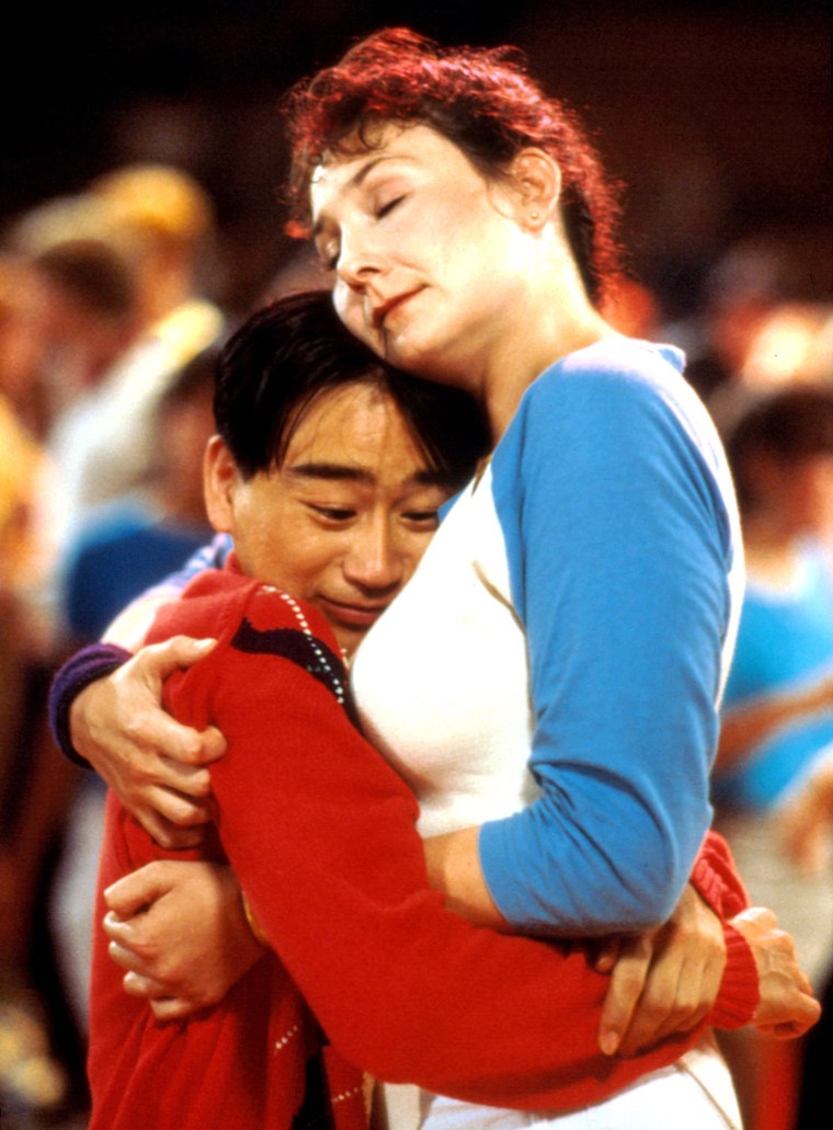 Image: Gedde Watanabe and Deborah Pollack, in "Sixteen Candles."